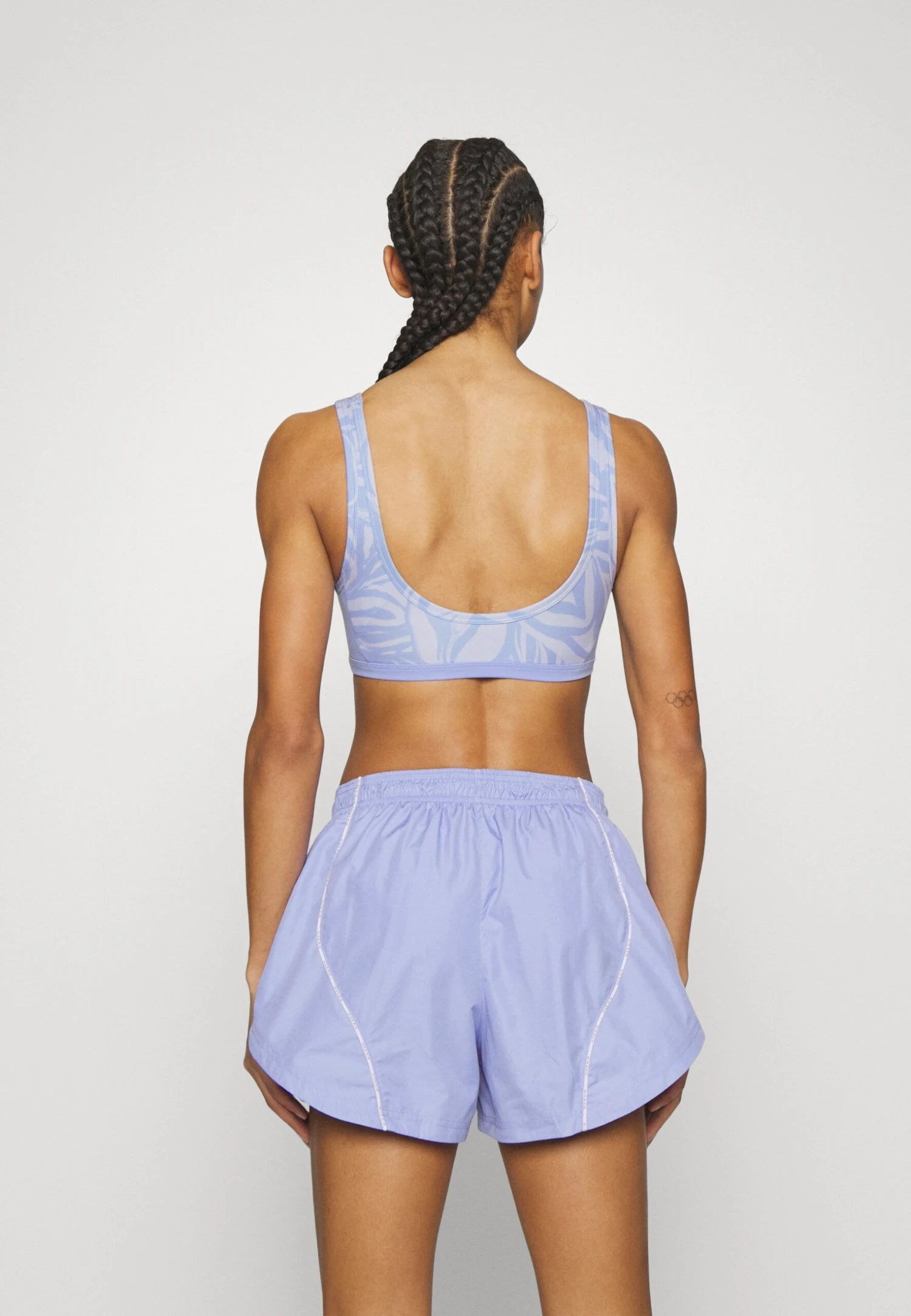 Roxy Heart Into It Bra - Medium Support Sports Bra - Purple Heather Fluid Flowers 5 Roxy Heart Into It Bra - Medium Support Sports Bra - Purple Heather Fluid Flowers - Image 3